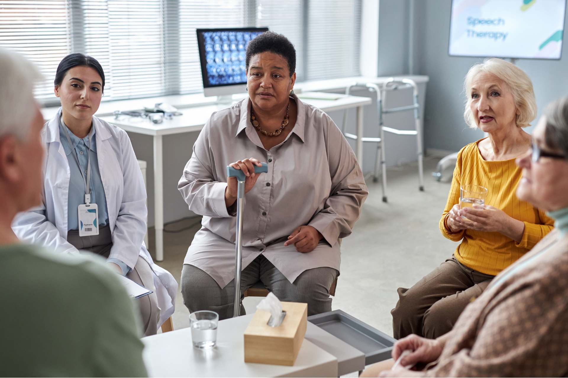 Breast_Cancer_Detection Senior women sit together at a doctors office talking to their doctors